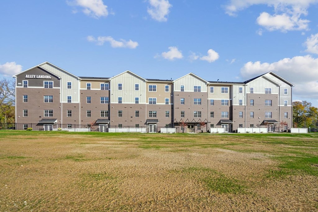 A large building with the name Alley Landing on the front.