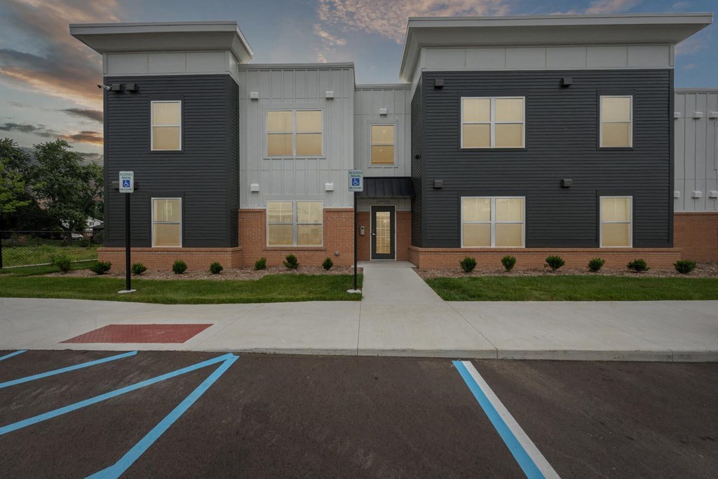 exterior view at dusk at the bradley braddock road station apartments