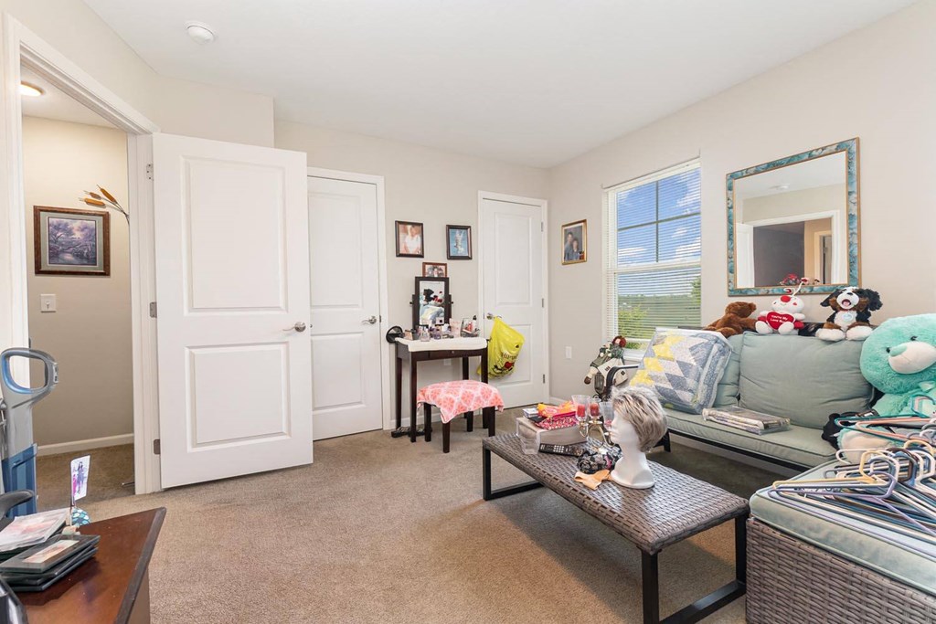 a living room with a couch and a table