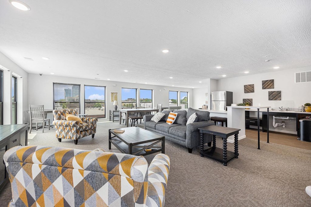 a living room with a couch and a table