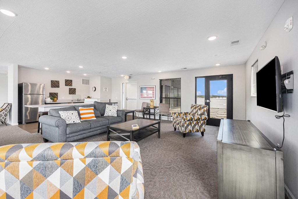 a living room with a couch and a tv