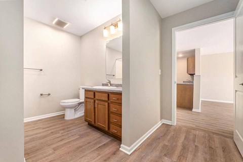 a renovated bathroom with a toilet and a mirror