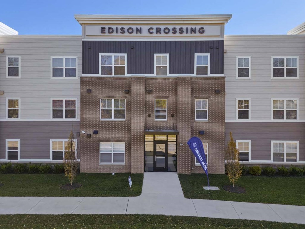 the front of the ebson crossing apartments building