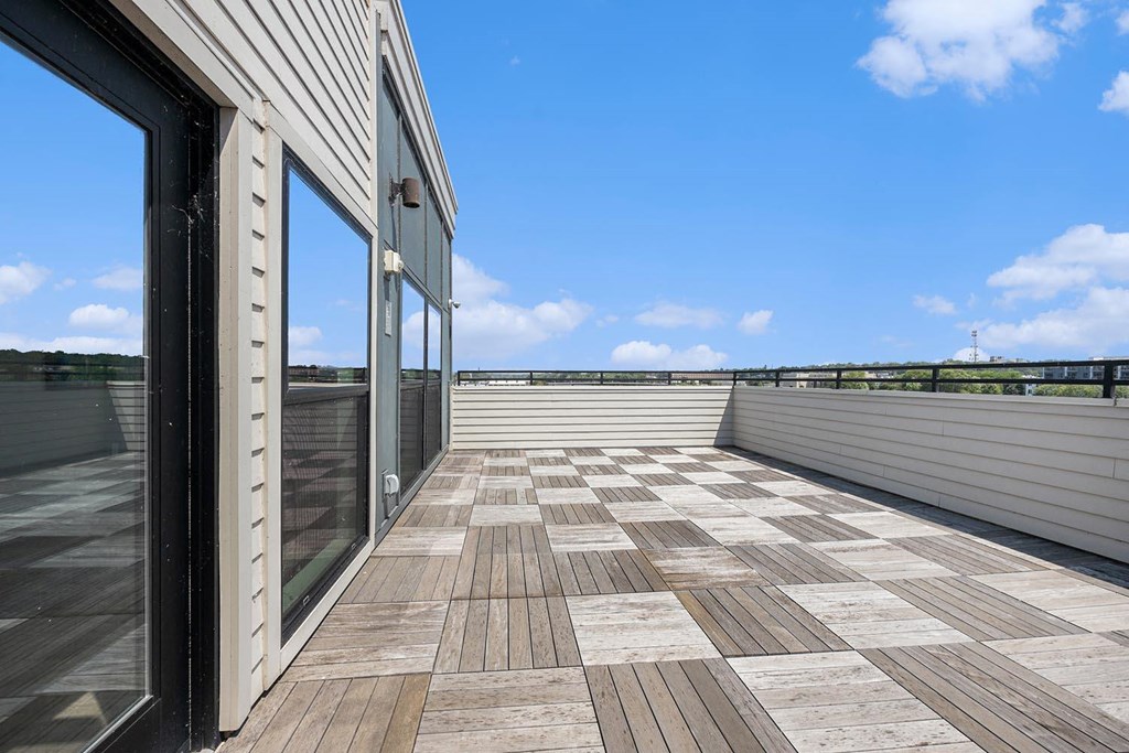 the deck has a view of the water and the sky