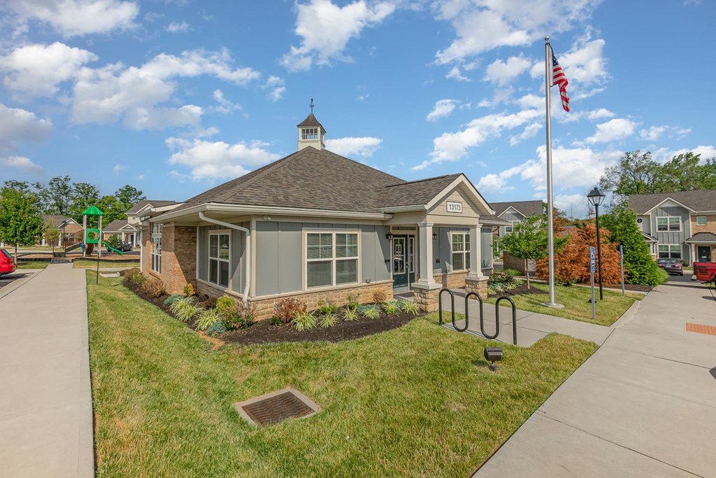 a building with an american flag and a flagpole in front of it