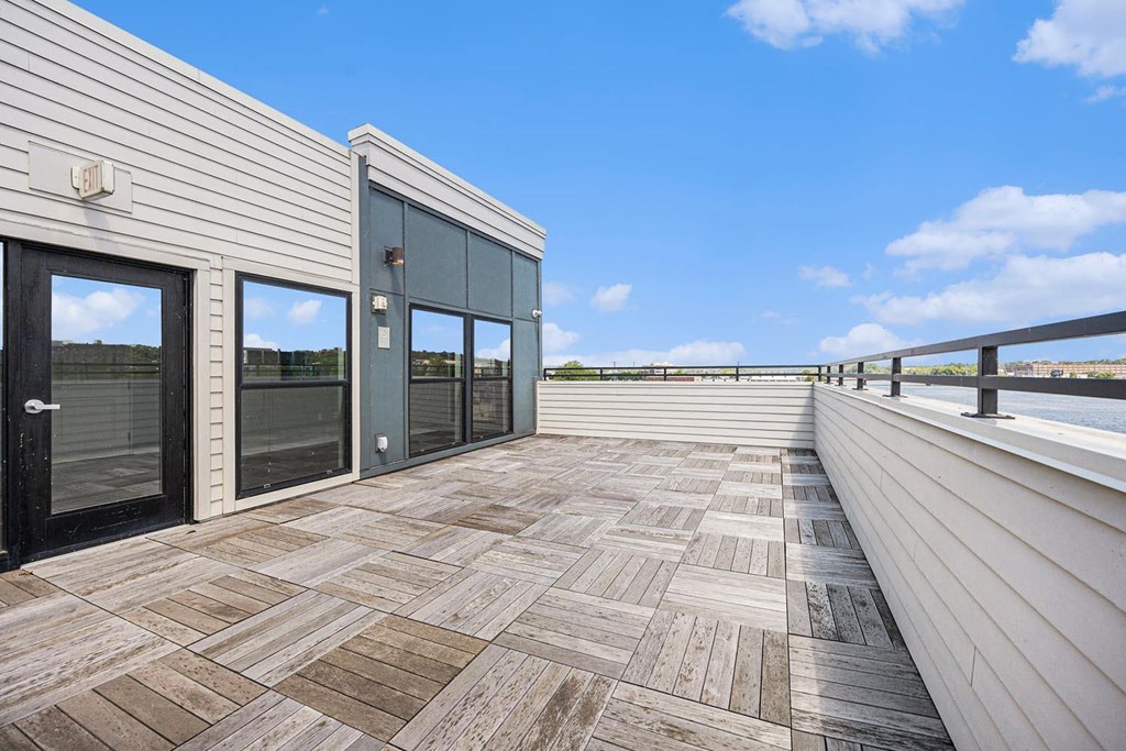 the deck has views of the water and the sky