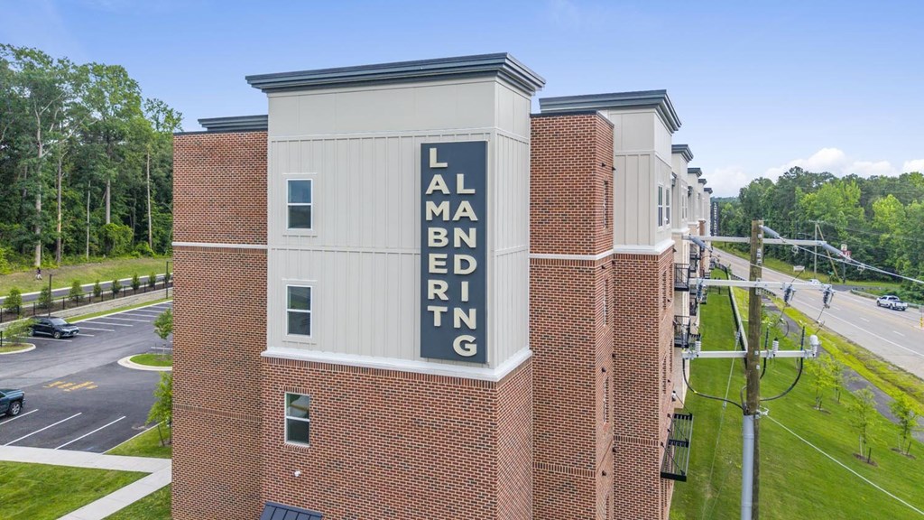 A tall building with the words "Lamar Bending" on it.