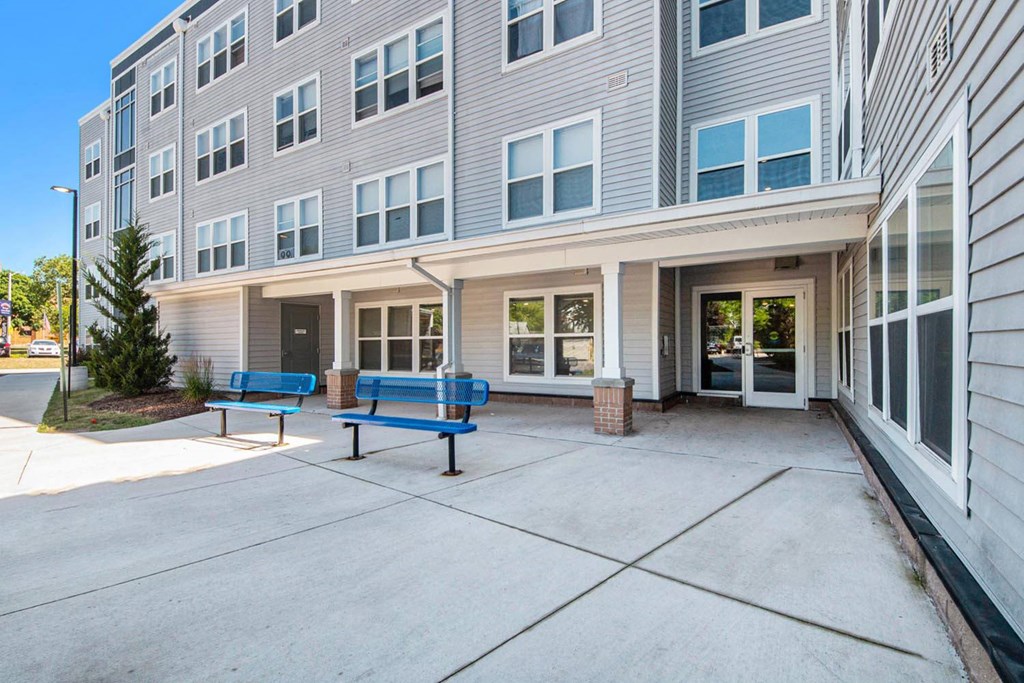 our apartments have a large patio with benches