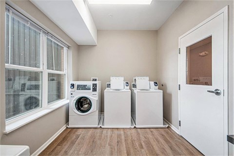 A laundry room with a washer and dryer.