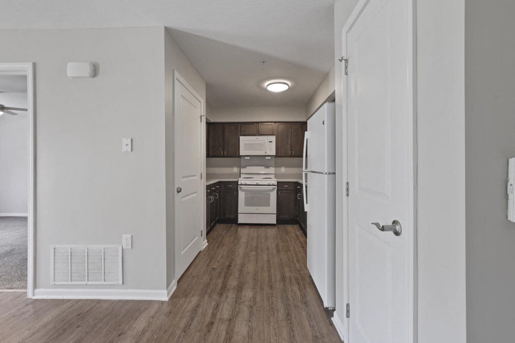 a renovated kitchen and living room in a new home