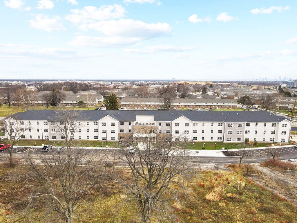 an aerial view of a large white building