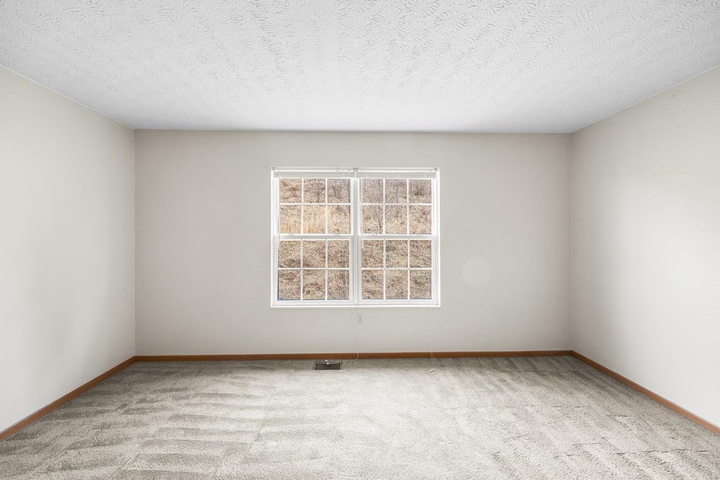 an empty room with a window