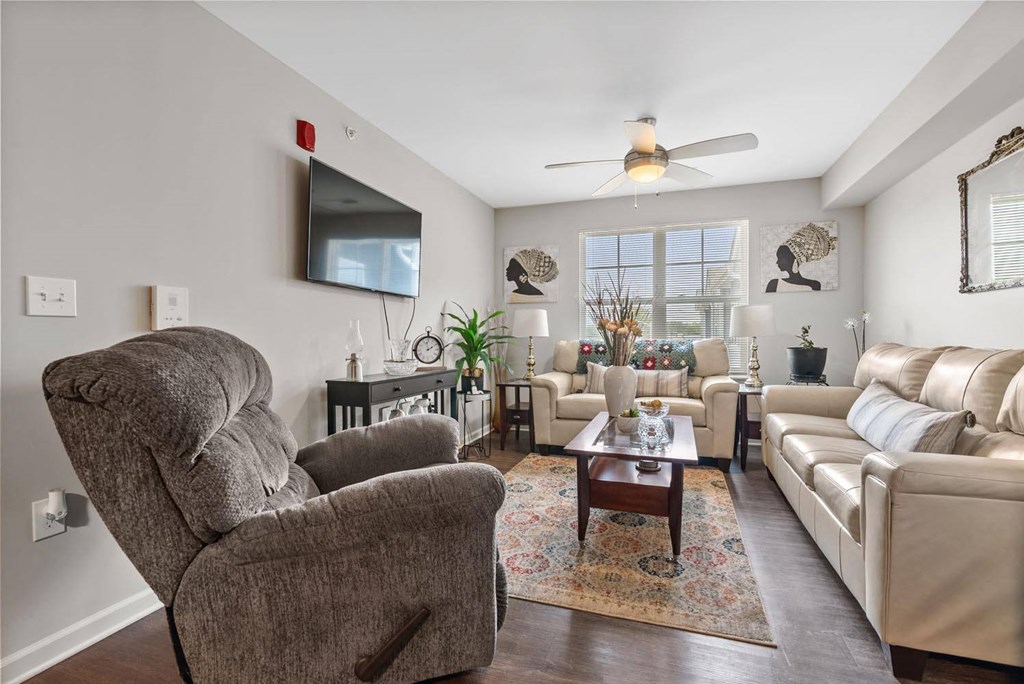 a living room with a couch and a chair