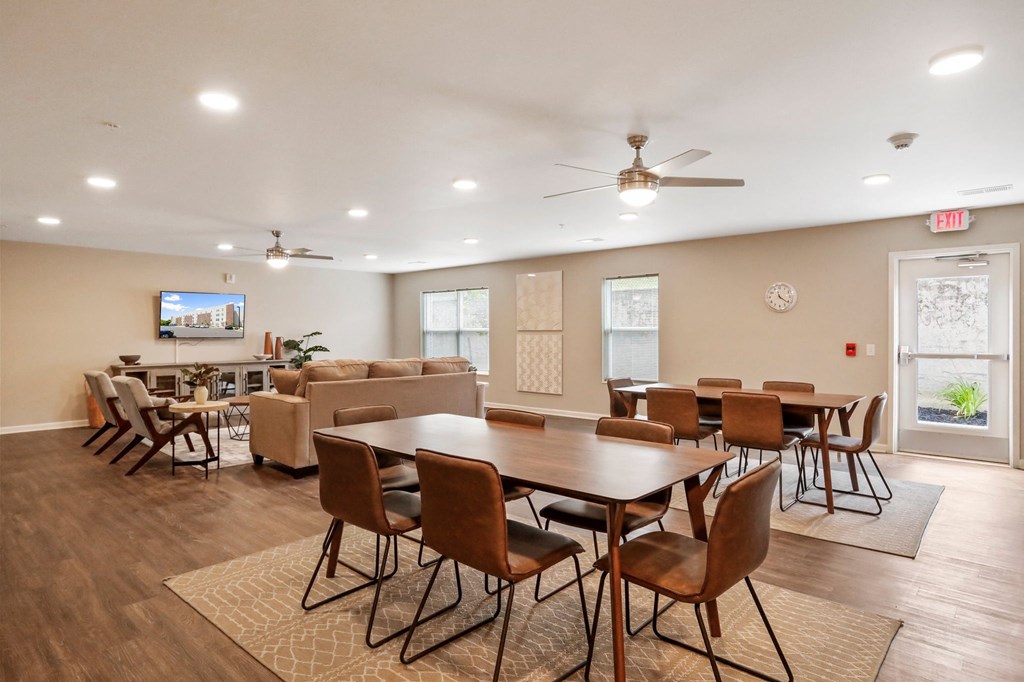 the reserve at bucklin hill clubhouse with tables and chairs
