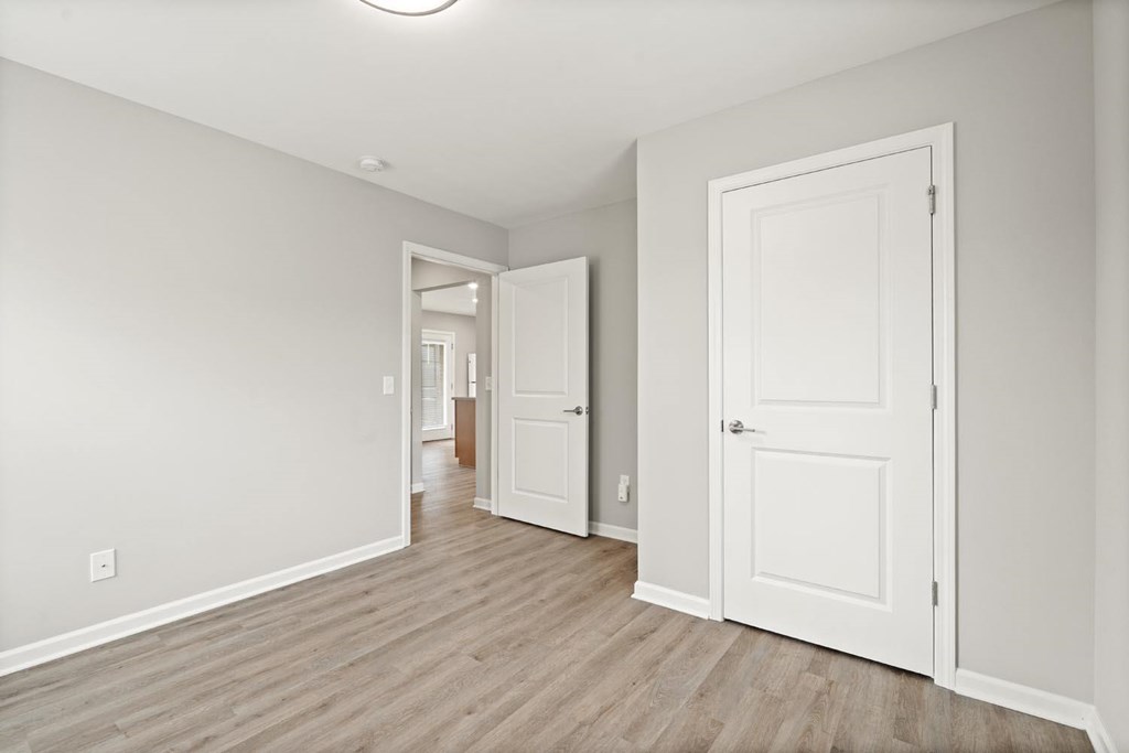 A white door is on the right side of the image.