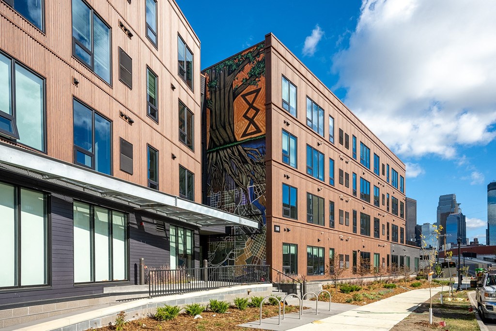 a view of a building with a sculpture on the side of it