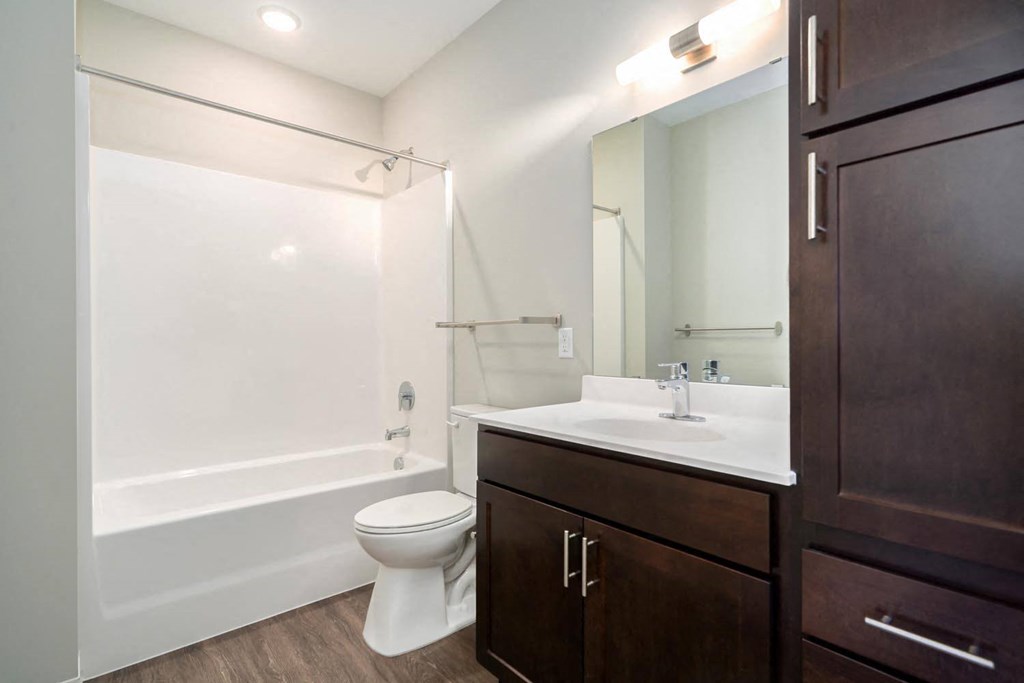 a bathroom with a toilet and a sink