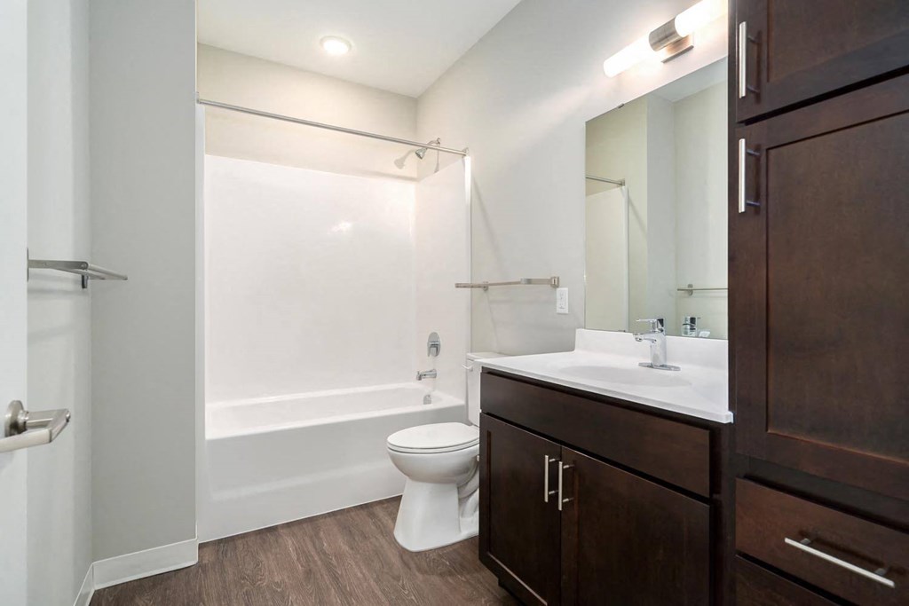 a bathroom with a toilet and a sink