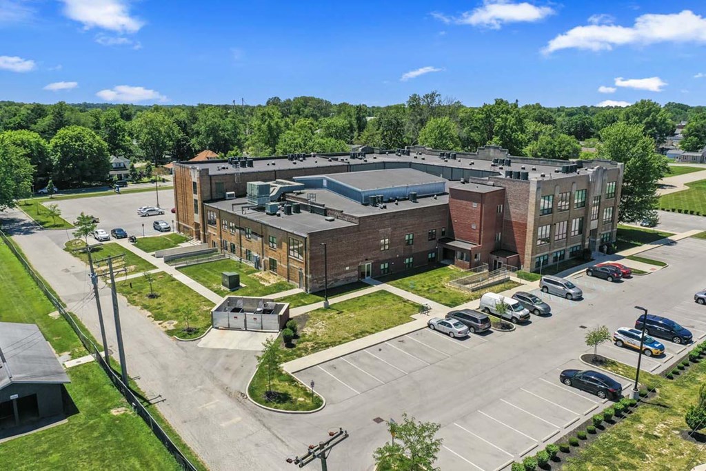 an aerial view of an office building and parking lot