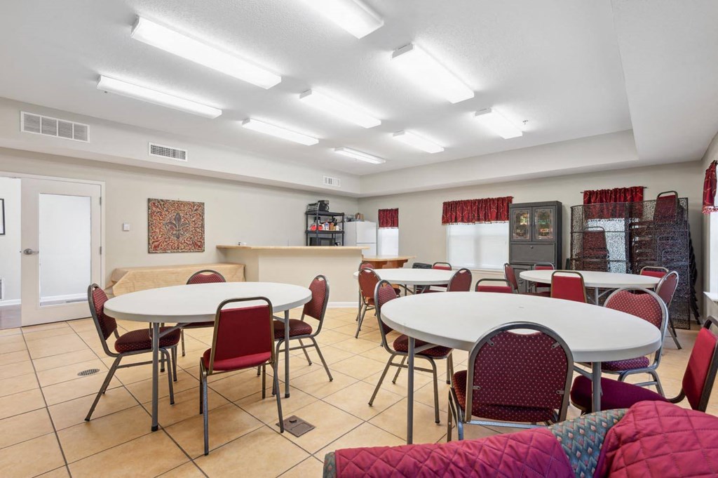 a dining room with tables and chairs