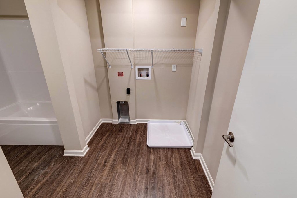 an empty bathroom with a shower and a bathtub