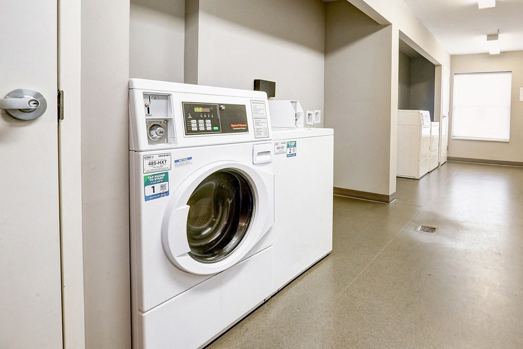 a washing machine and dryer in a laundry room