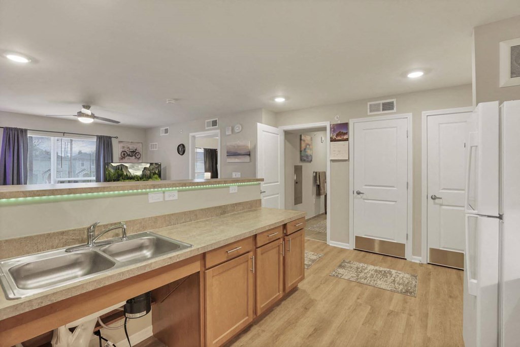 a kitchen with a sink and a counter top