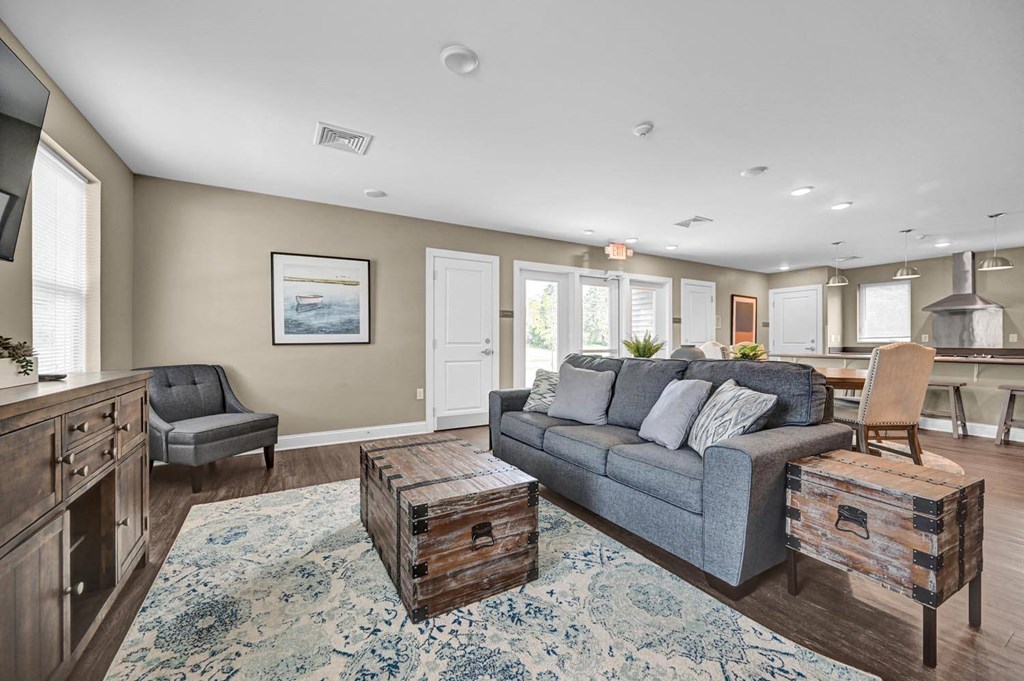 a living room with a couch and a chair