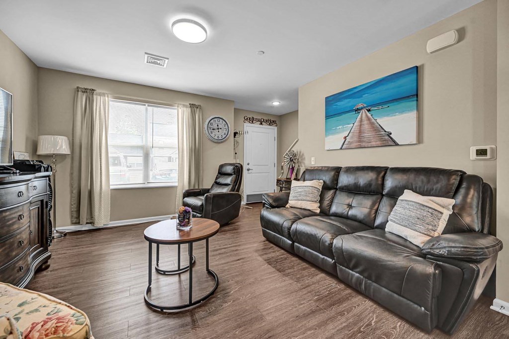 a living room with two couches and a coffee table