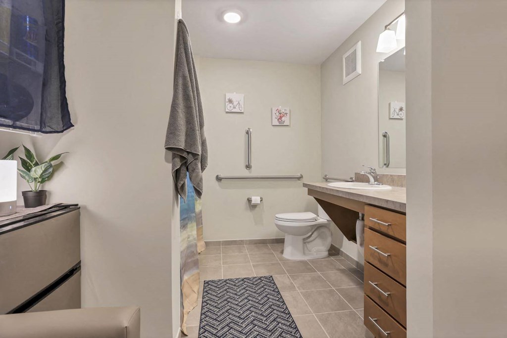 a bathroom with a toilet and a sink