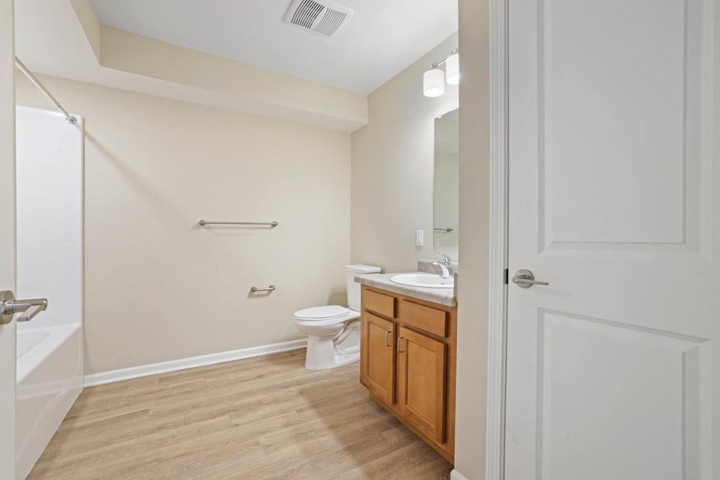 a bathroom with a toilet and a sink