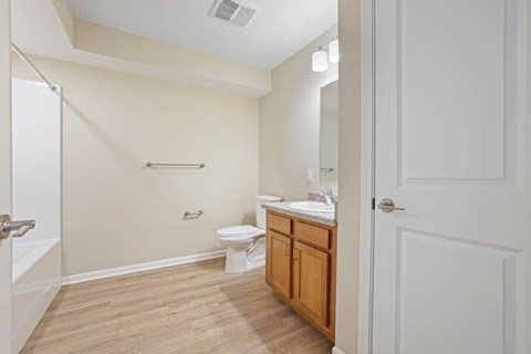 a bathroom with a toilet and a sink
