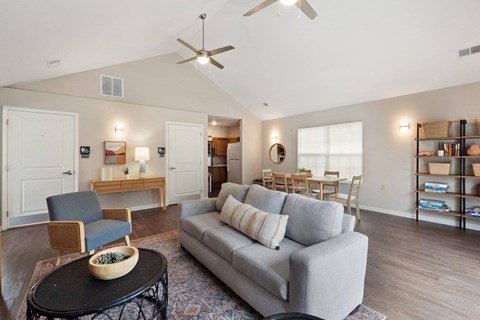 a living room with a couch and a table