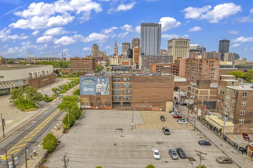 an aerial view of a parking lot and the philadelphia skyline