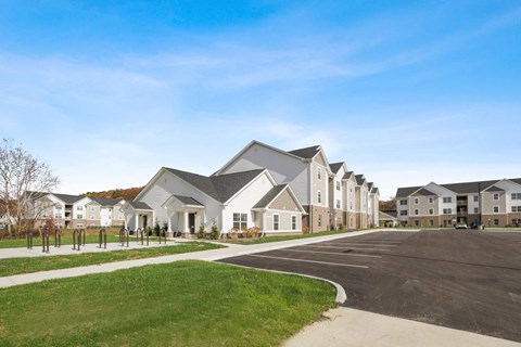 a row of houses on the side of a street