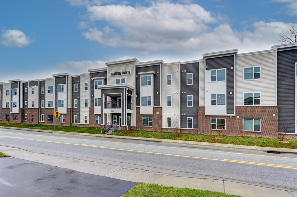 A row of apartment buildings with the name "American North" on the top.