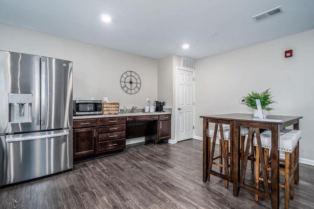 a kitchen with stainless steel appliances and a counter top