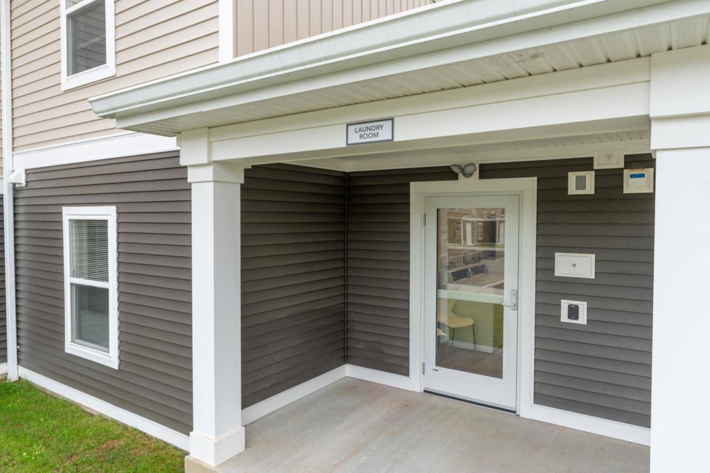 a front door of a house with a porch