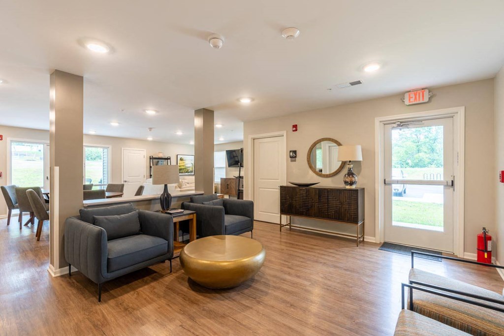 a living room with couches and a table