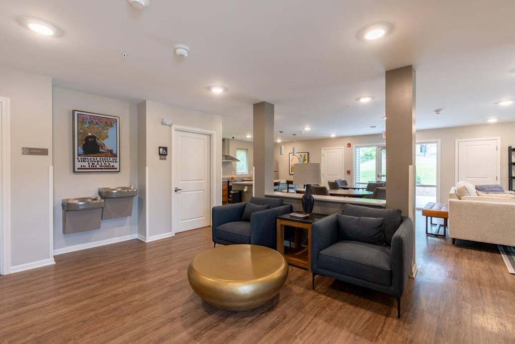 a living room with couches and a table