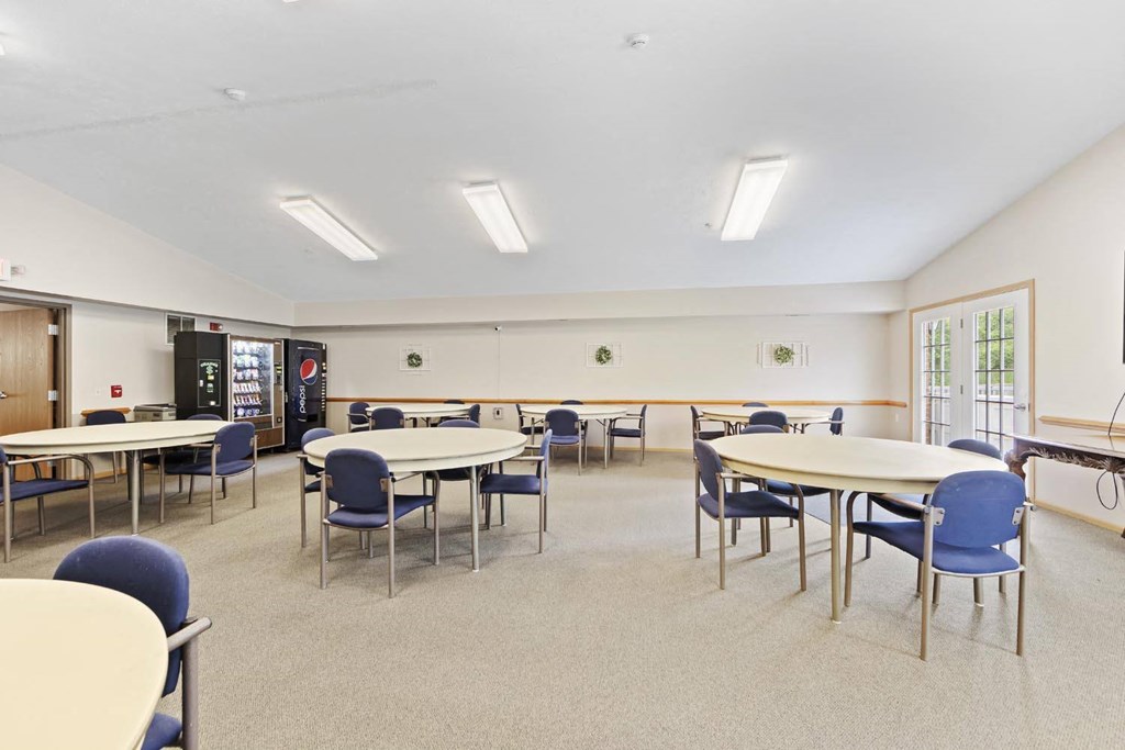 a dining room filled with tables and chairs