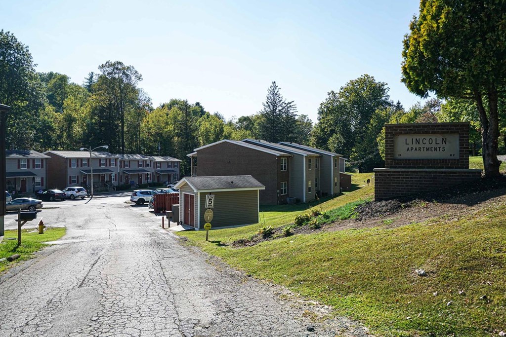 a view of the park apartments from the street