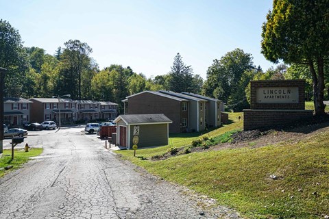 a view of the park apartments from the street