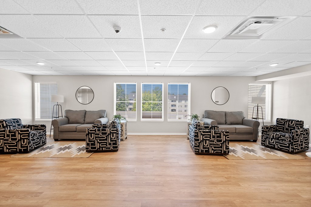 the preserve at cardinal courts living room with couches and chairs