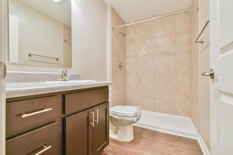 a bathroom with a toilet sink and bathtub