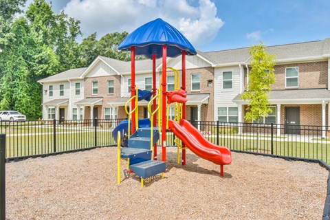 the playground at the whispering winds apartments in pearland, tx