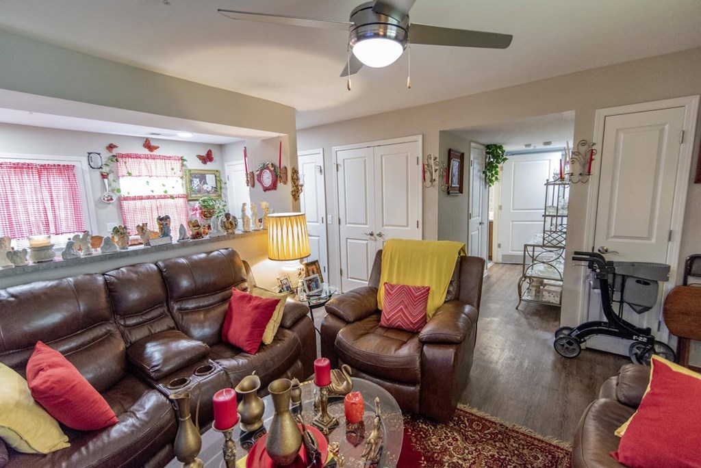 a living room with couches and a table