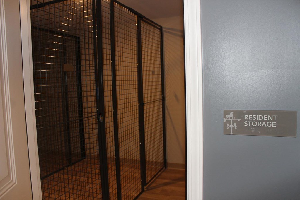 a walk in shower in a room with a restaurant store sign