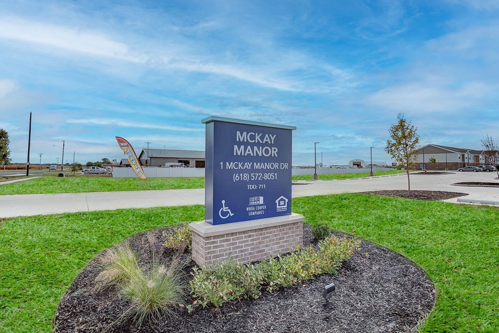 the sign at the entrance of the park