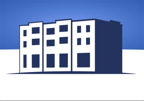 a silhouette of a building against a blue sky